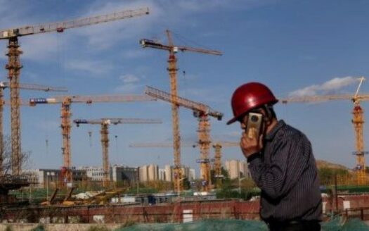 A worker is seen at a China construction site Rs