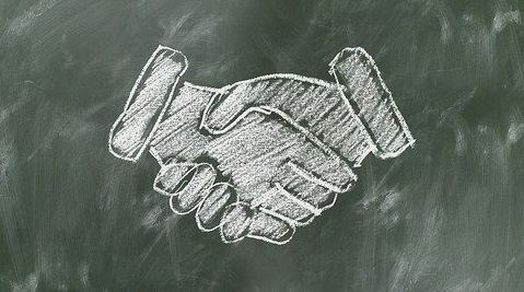 deal handshake mergers and acquisitions