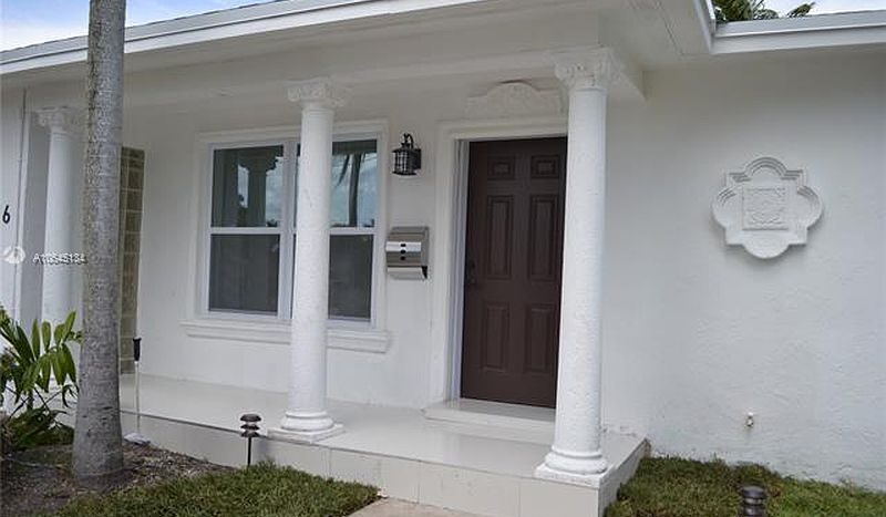 hallandale house with land front door view