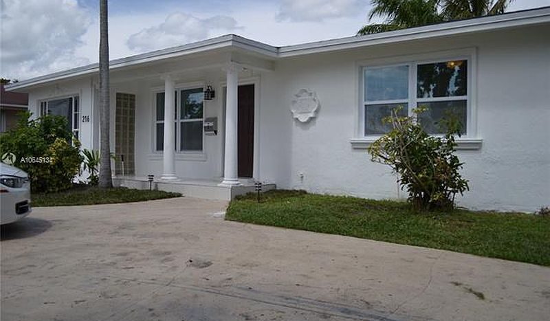 hallandale house with land front view 4